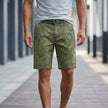 Army green men's casual work shorts with leaf print and belt, FJØRNA pants for comfortable outdoor or casual wear.