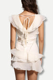 FJØRNA asymmetric ruffled mini dress for women, featuring a stylish design suitable for party and day wear.