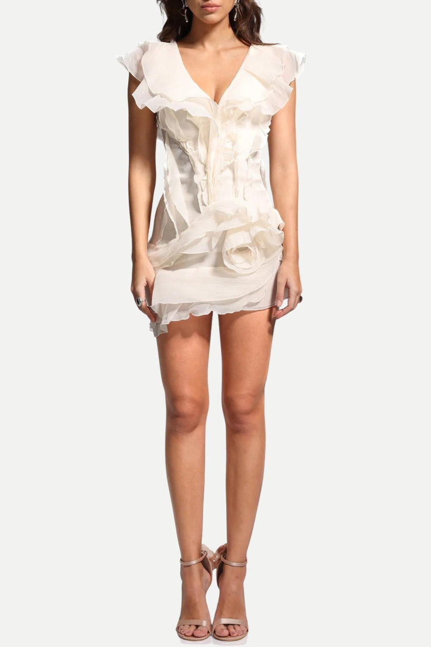 FJØRNA asymmetric ruffled women's mini dress featuring a stylish design, perfect for party and day wear, shown on a model.