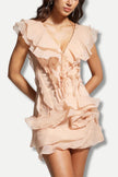 FJØRNA asymmetric ruffled women's mini dress, stylish party and day wear with layered ruffle design.