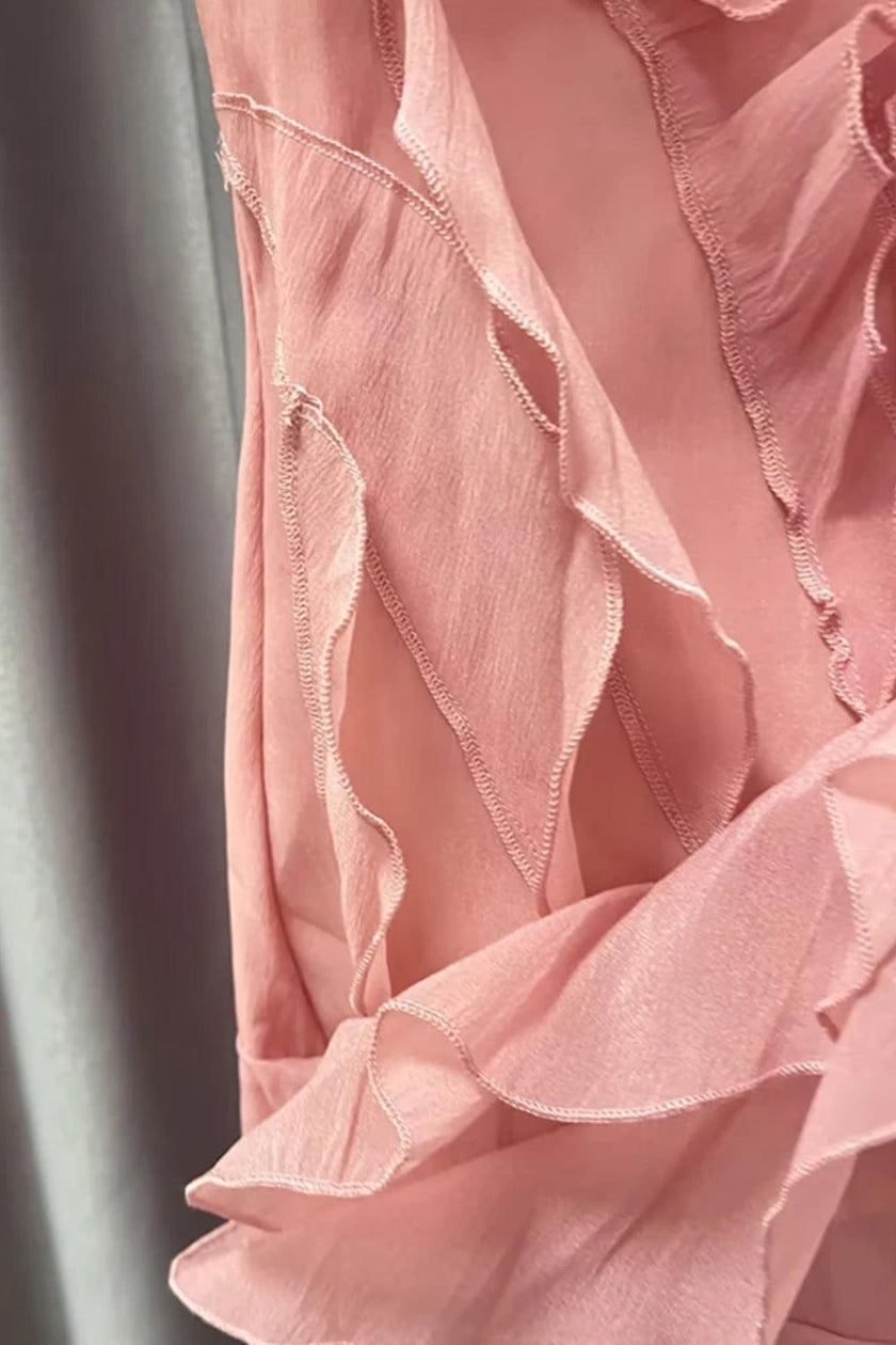 FJØRNA asymmetric ruffled mini dress for women, featuring a stylish, flowy design perfect for party or day wear.