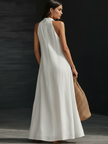 Women’s FJØRNA Aveline halter maxi dress with a flowy A-line silhouette and lightweight fabric, perfect for elegant summer wear.