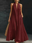 Women’s FJØRNA Aveline halter maxi dress with a flowy A-line silhouette, lightweight fabric, perfect for warm weather.