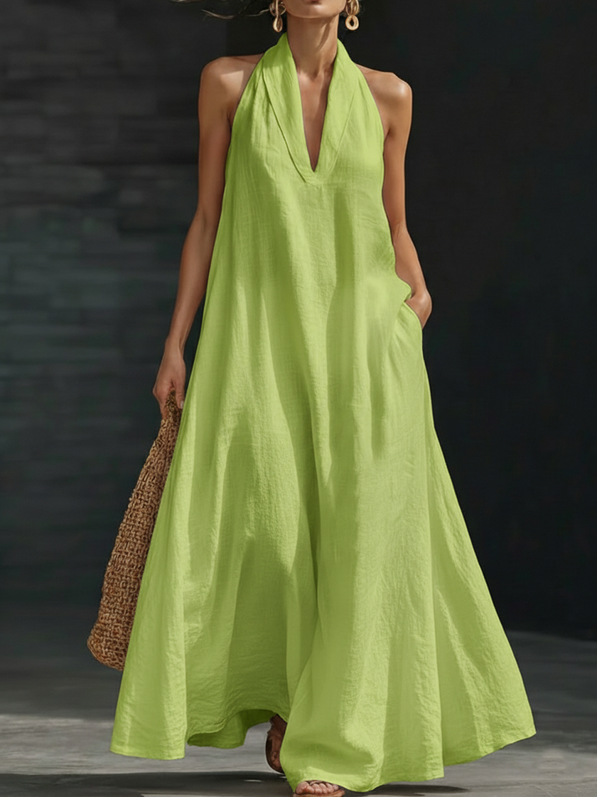 Women’s FJØRNA Aveline halter maxi dress with a flowy A-line silhouette and lightweight fabric, perfect for warm weather.