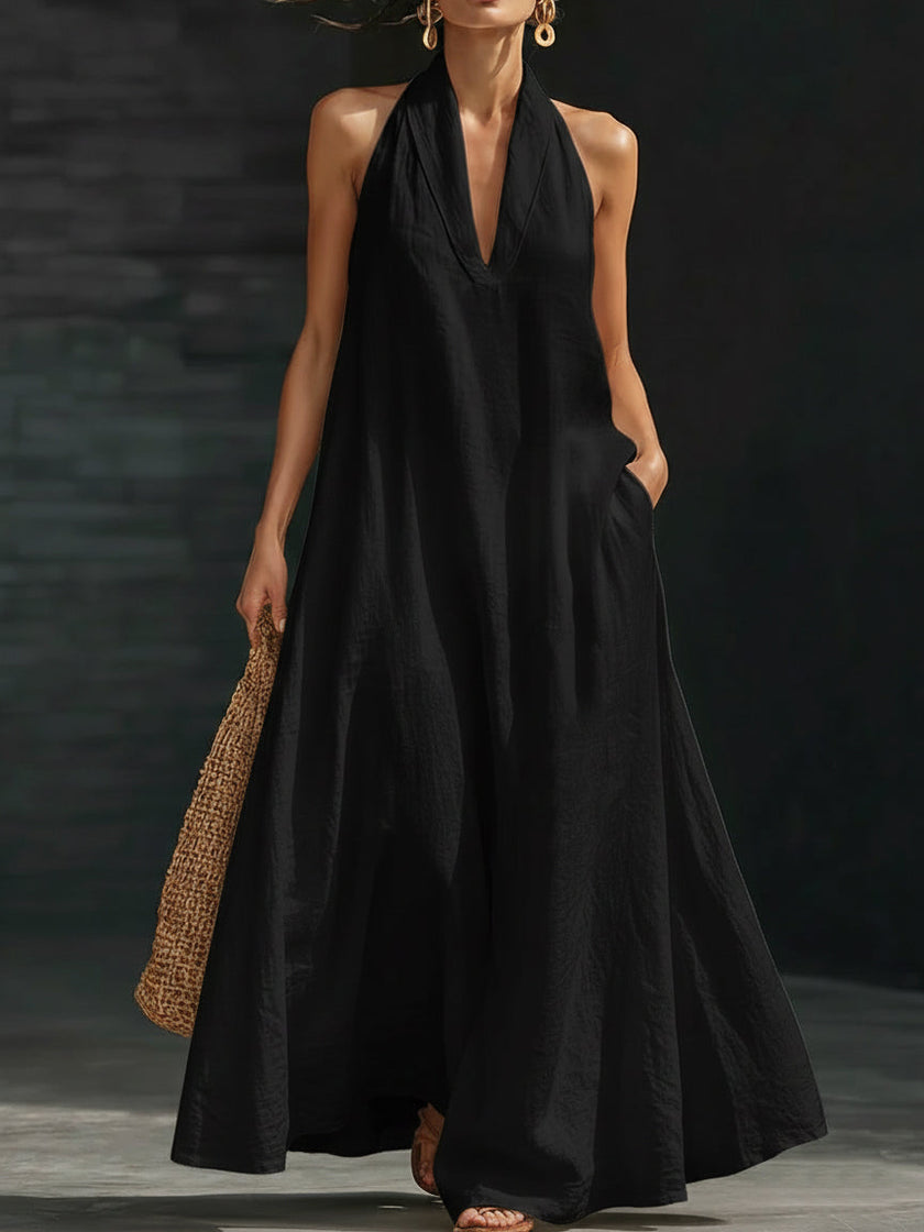 Women’s FJØRNA Aveline halter maxi dress with a flowy A-line silhouette and lightweight fabric, perfect for summer wear.