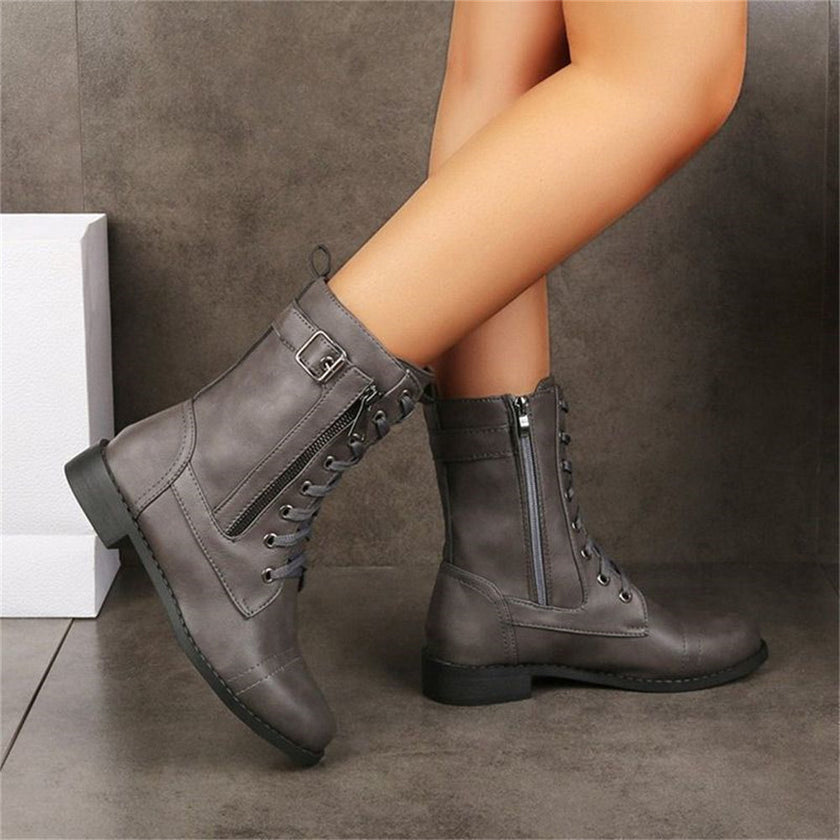 FJØRNA Erica Toe Side Zipper Orthopedic Boots showing a close-up of the beige boot with zipper detail and supportive sole.