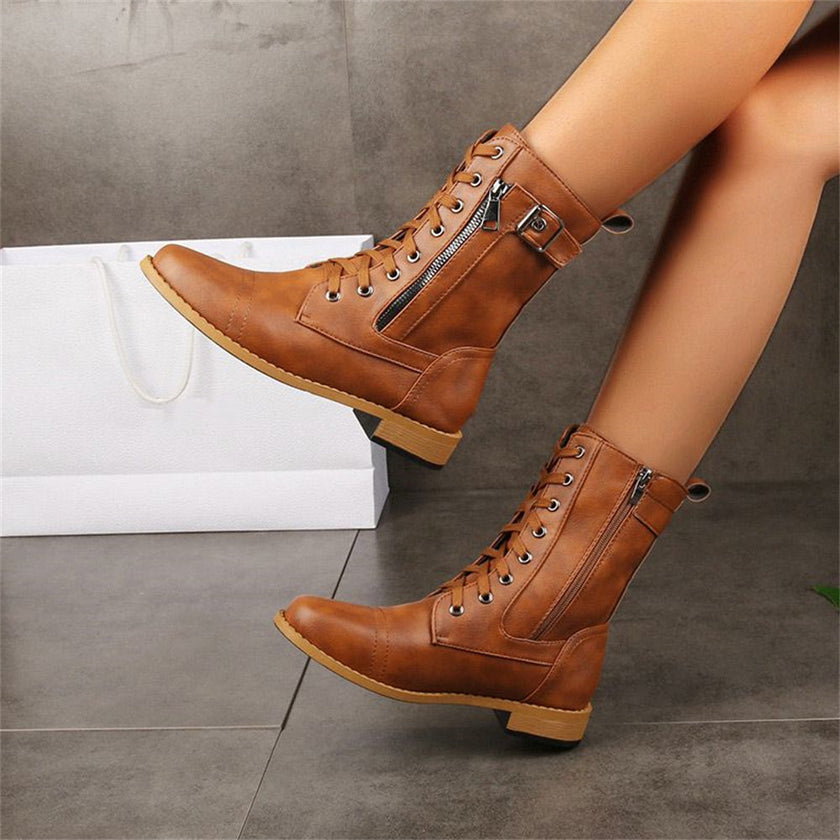 FJØRNA Erica Toe Side Zipper Orthopedic Boots in black leather with side zipper and sturdy sole, designed for comfort and support.