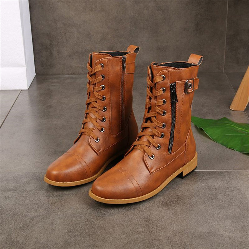 FJØRNA Erica Toe Side Zipper Orthopedic Boots in black, showcasing sturdy design with side zipper and supportive soles.