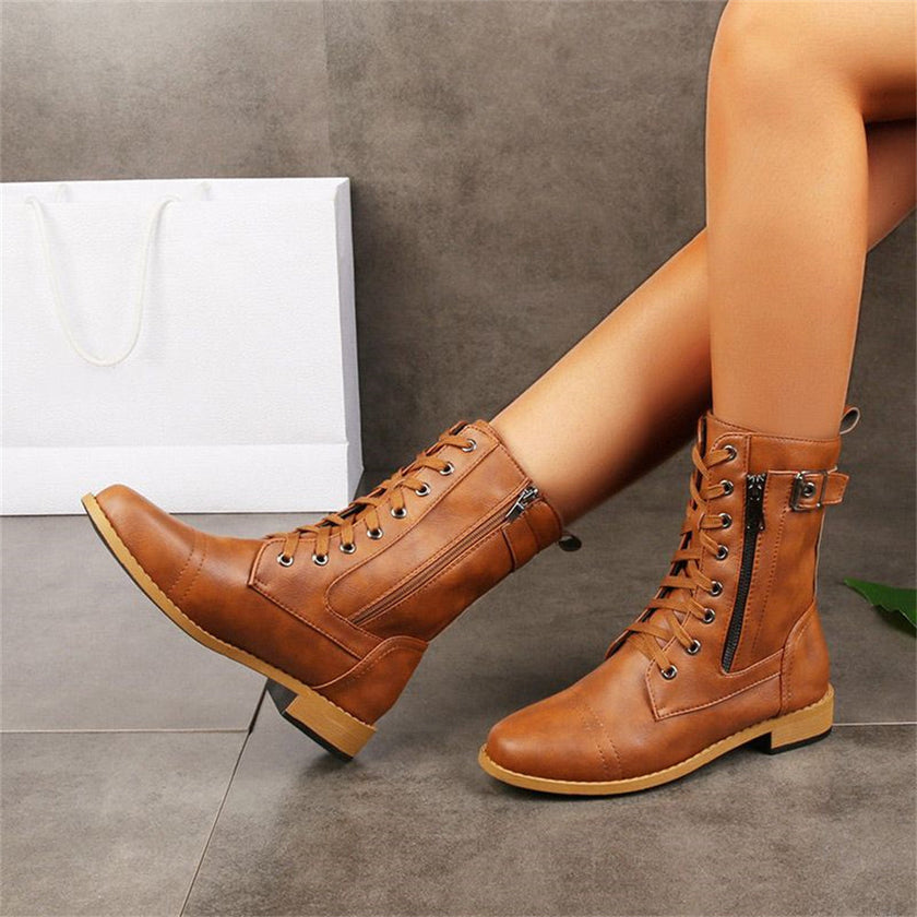 FJØRNA Erica Toe Side Zipper Orthopedic Boots featuring a stylish design and functional zipper detail.