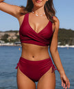 FJØRNA women's high waist bikini set with v-neck top, sporty fit, navy color, featuring a stylish and supportive swimwear design.