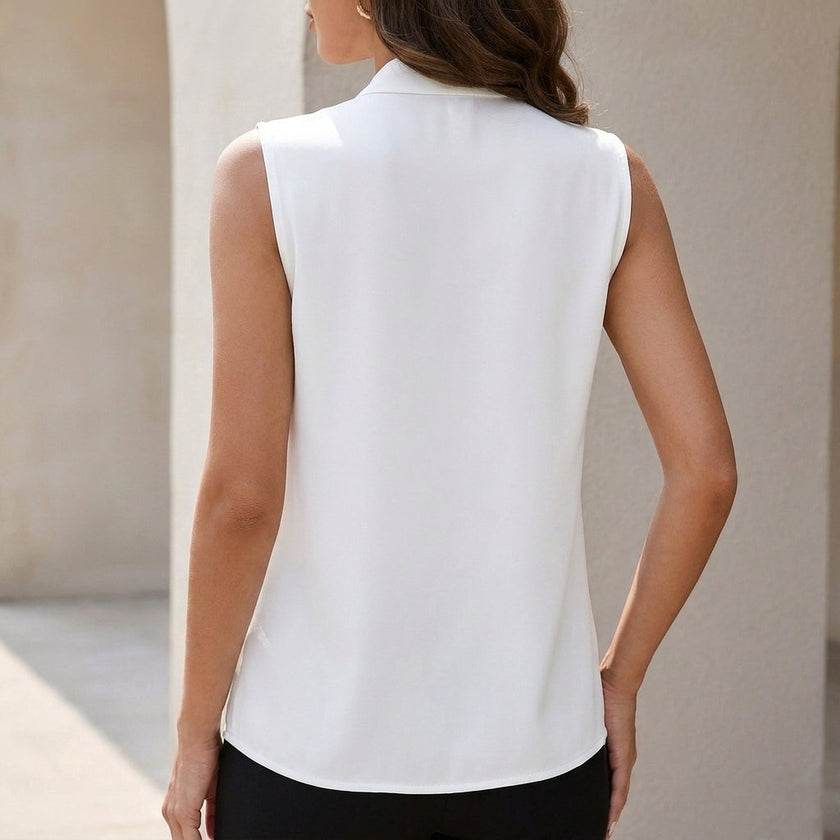 FJØRNA sleeveless V-neck blouse for women with back pleats, tailored fit, and front pleats, stylish and elegant design.