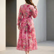FJØRNA belted tiered A-line wrap maxi dress for women, back view showing flowing fabric and waist tie detail.