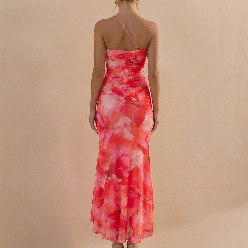Back view of FJØRNA fitted one-shoulder mesh overlay maxi dress with ruched detail and elegant design.