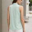 FJØRNA women's summer V-neck sleeveless blouse with high waist, back detail, lightweight fabric, perfect for warm weather.