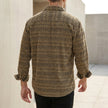 Men's relaxed button-front shirt with geometric pattern by FJØRNA, shown from the back. Comfortable and stylish men's top.