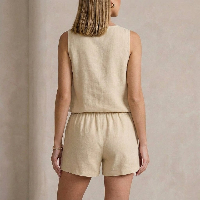 FJØRNA women's two-piece co-ord set with button-front top and matching pants, shown from the back.