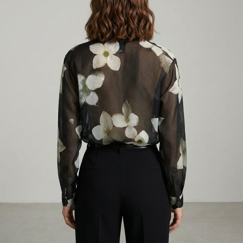FJØRNA summer floral blouse for women with long sleeves, shown from the back, lightweight and stylish for warm weather.