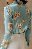 FJØRNA floral satin summer blouse for women, back view showcasing lightweight, elegant floral design and silky fabric.