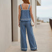 FJØRNA coastal stripe sleeveless top and wide-leg pant set shown from the back, featuring lightweight fabric and relaxed fit.