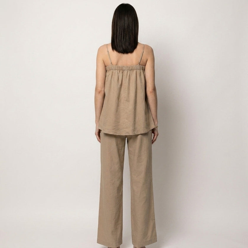 FJØRNA relaxed coastal camisole and wide-leg pants set shown from the back, featuring lightweight fabric and casual fit.