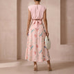 FJØRNA women's summer two-piece pleated co-ord set shown from the back, stylish and lightweight for warm weather.