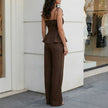 Back view of FJØRNA elegant peplum cami top and wide-leg trouser set, showcasing stylish 2-piece fashion ensemble.