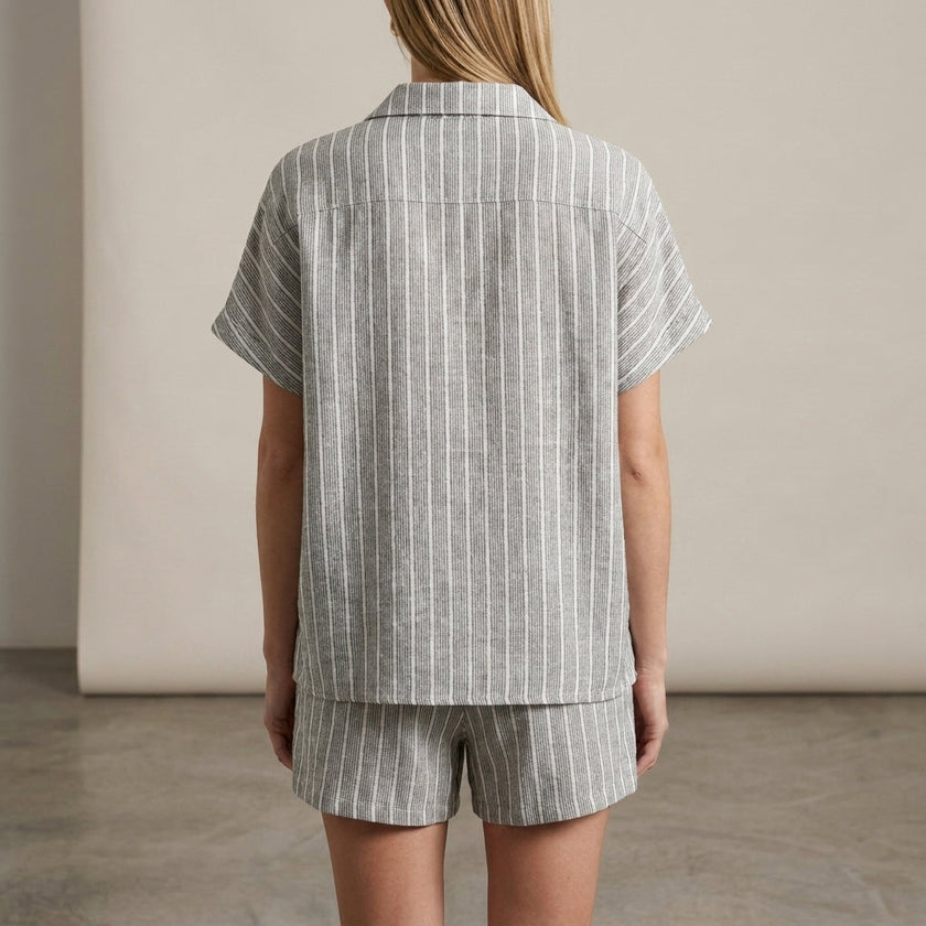 FJØRNA textured vertical stripe relaxed two-piece shirt and drawstring shorts set, back view showing casual fit and fabric details.