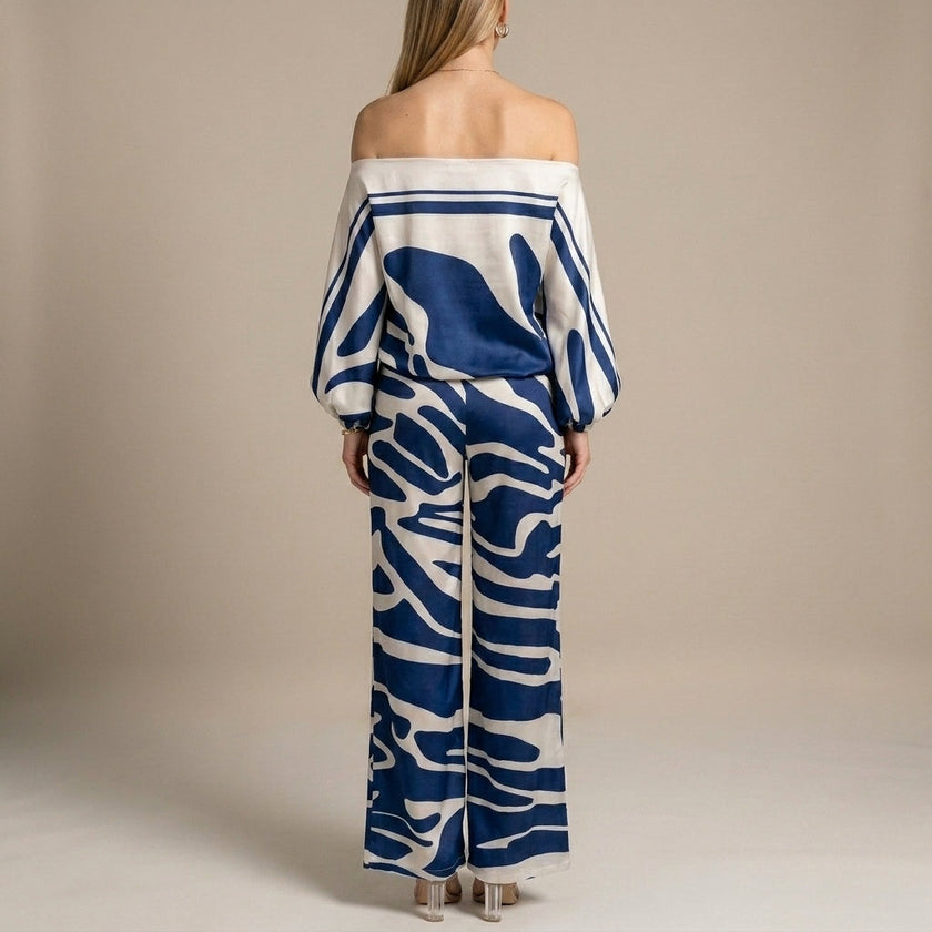 FJØRNA elegant two-piece print wide-leg co-ord set for women, shown from the back, featuring stylish matching top and pants.