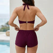 FJØRNA women's summer bikini with halter neck and ruched design, shown from the back in this swimwear image.