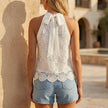 FJØRNA summer floral halter neck blouse for women, back view showing lightweight fabric and vibrant floral pattern.