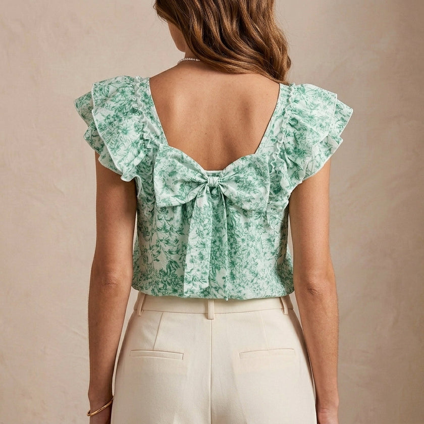 FJØRNA summer floral blouse for women with square neckline, shown from the back, lightweight and stylish women's top.