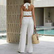 Back view of FJØRNA effortless halter top and wide-leg lounge set, stylish 2-piece set for comfortable casual wear.