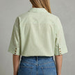FJØRNA women's striped linen summer blouse shown from the back, lightweight and casual top for warm weather.
