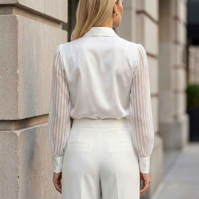 FJØRNA summer women's blouse with high waist and striped pattern, shown from the back, lightweight and stylish for warm weather.