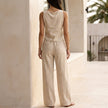 FJØRNA women's summer two-piece set with ruched V-neck top and matching skirt, shown from the back, stylish and comfortable.