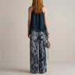 FJØRNA Midnight Mist halter blouse and flowing pants 2-piece set shown from the back, featuring a stylish halter design and relaxed fit.