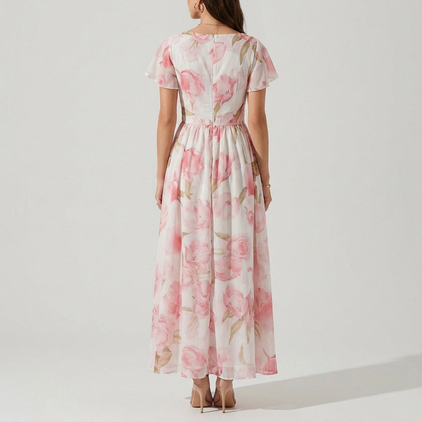 FJØRNA women's elegant mini dress with V-neck and flutter sleeves, shown from the back in a stylish, fitted design.