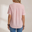 FJØRNA women's summer blouse with striped short sleeves, back view showing lightweight fabric and casual fit.