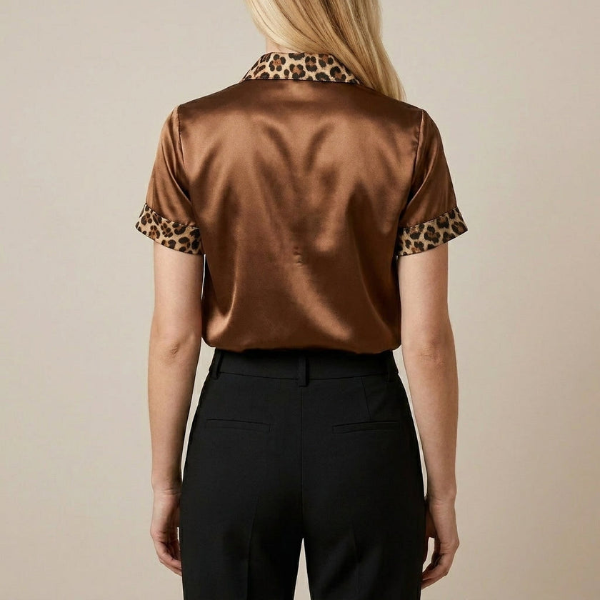 FJØRNA women's leopard print summer blouse with short sleeves, shown from the back in a stylish, lightweight top.