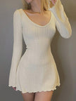 FJØRNA white backless mini dress, sleeveless design with a fitted silhouette, stylish for casual or evening wear.