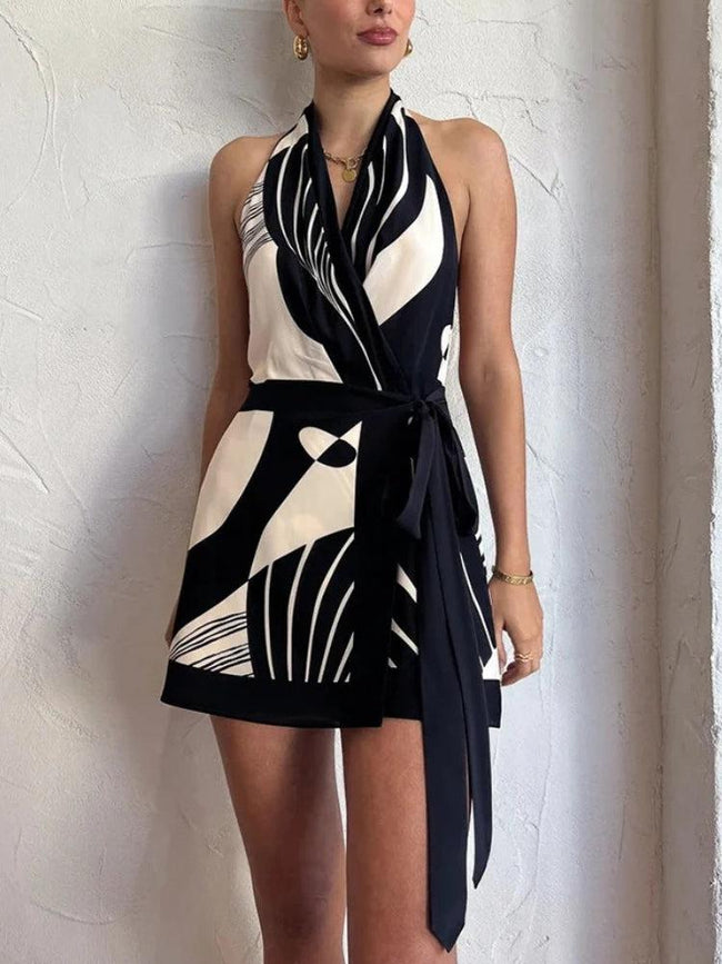 FJØRNA backless wrap-front women's mini dress showcasing a stylish party and day wear design with a fitted silhouette.