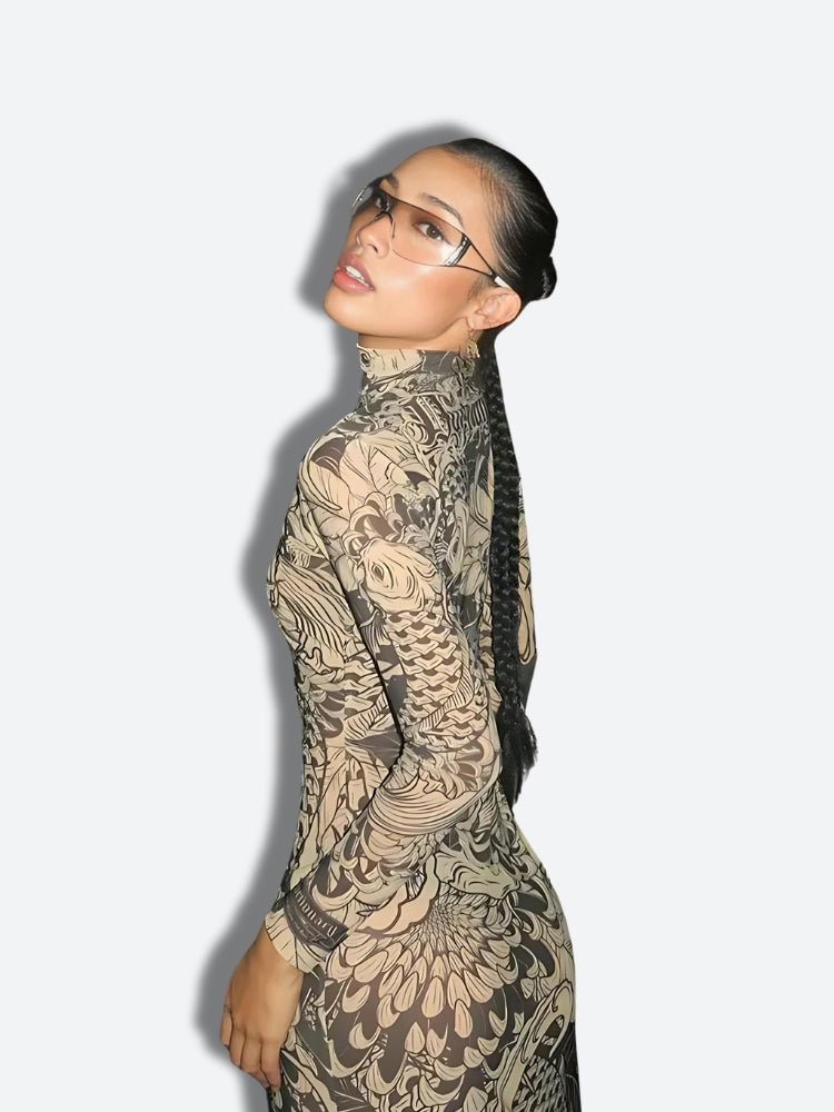 White Baddie Tattoo Maxi Dress by FJØRNA featuring a fitted silhouette and intricate tattoo-inspired print.