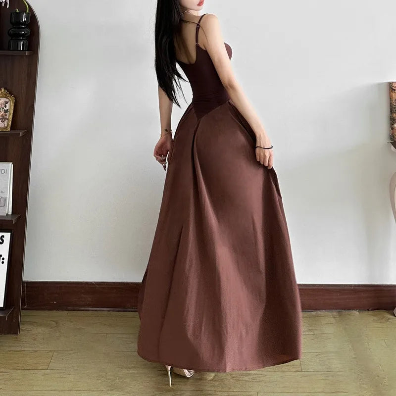 FJØRNA women's Basque waist dress, available as mini, midi, and maxi, shown in a stylish, fitted silhouette with a flattering waist.