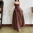 FJØRNA women's Basque waist dress in mini, midi, or maxi length, featuring fitted bodice and flowing skirt, elegant and stylish.