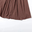 FJØRNA women's basque waist dress in mini, midi, and maxi lengths, featuring a fitted bodice and stylish silhouette.
