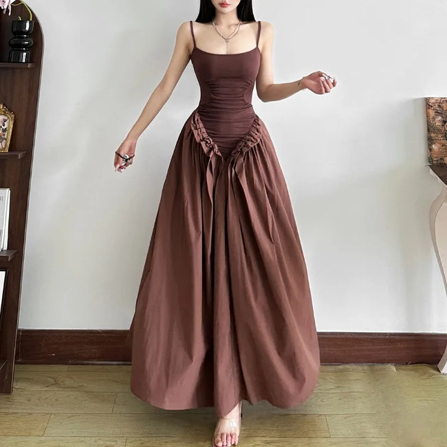 FJØRNA women's Basque waist dress in mini, midi, and maxi styles, featuring fitted bodice and flowing skirt in elegant fabric.