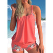 FJØRNA women's two-piece tankini swimwear set with a patterned top and solid bottoms, suitable for beach and pool.