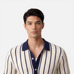 Beige and blue striped men's lightweight knit polo shirt by FJØRNA, classic fit, perfect for summer casual wear.