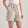 Beige and white FJØRNA mini dress for women with a drawstring linen design, casual and elegant summer clothing.