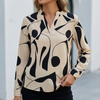 Beige FJØRNA relaxed print blouse for women with a shirt collar and abstract pattern, displayed on a white background.